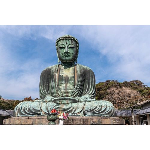 The Great Buddha-Daibutsu-offerings in front-blue sky above in Kamakura-Japan